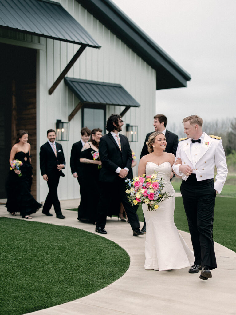 wedding party leaving the ceremony space