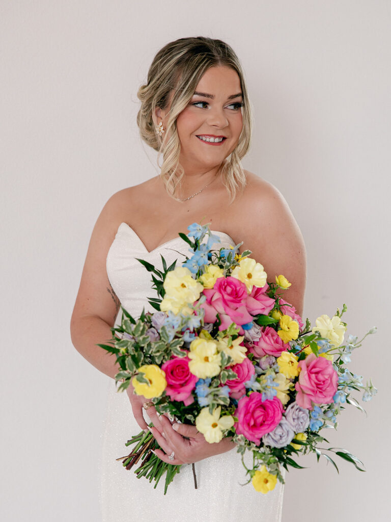 solo bride portrait smiling away from the camera