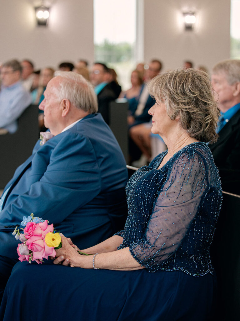 parents watching the wedding ceremony