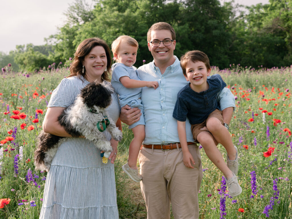 spring family mini session in a flower field