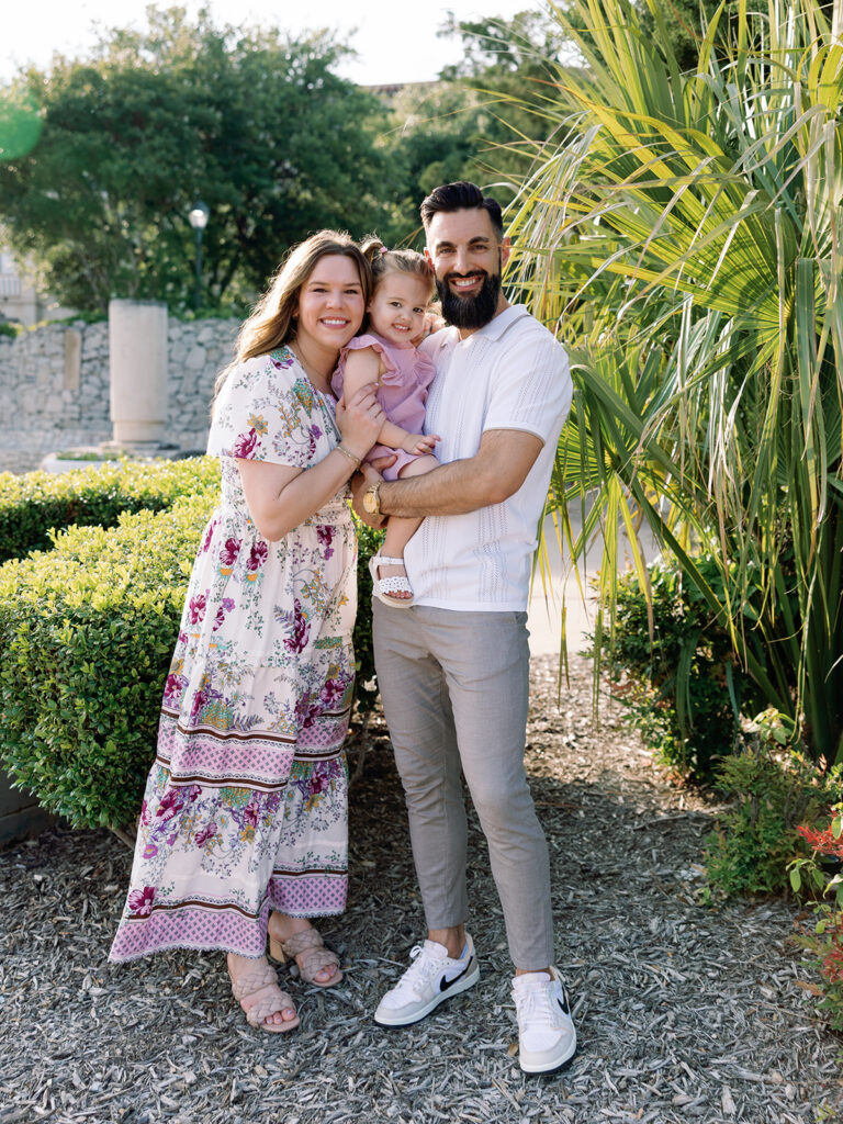 mom dad and young daughter family photo session in north dallas