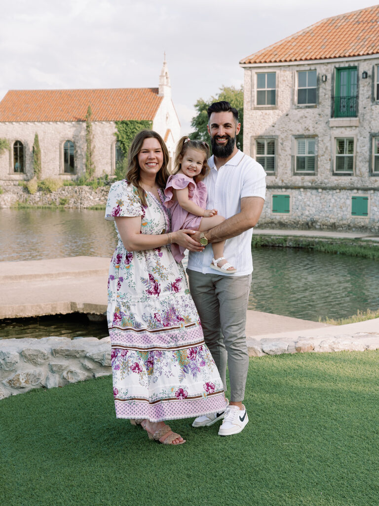 mom dad and young daughter family photo session in north dallas