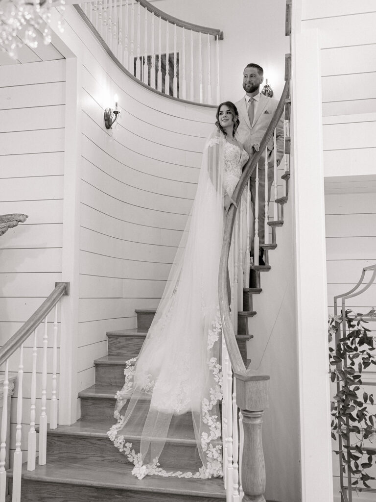Bride and groom portrait on a white staircase