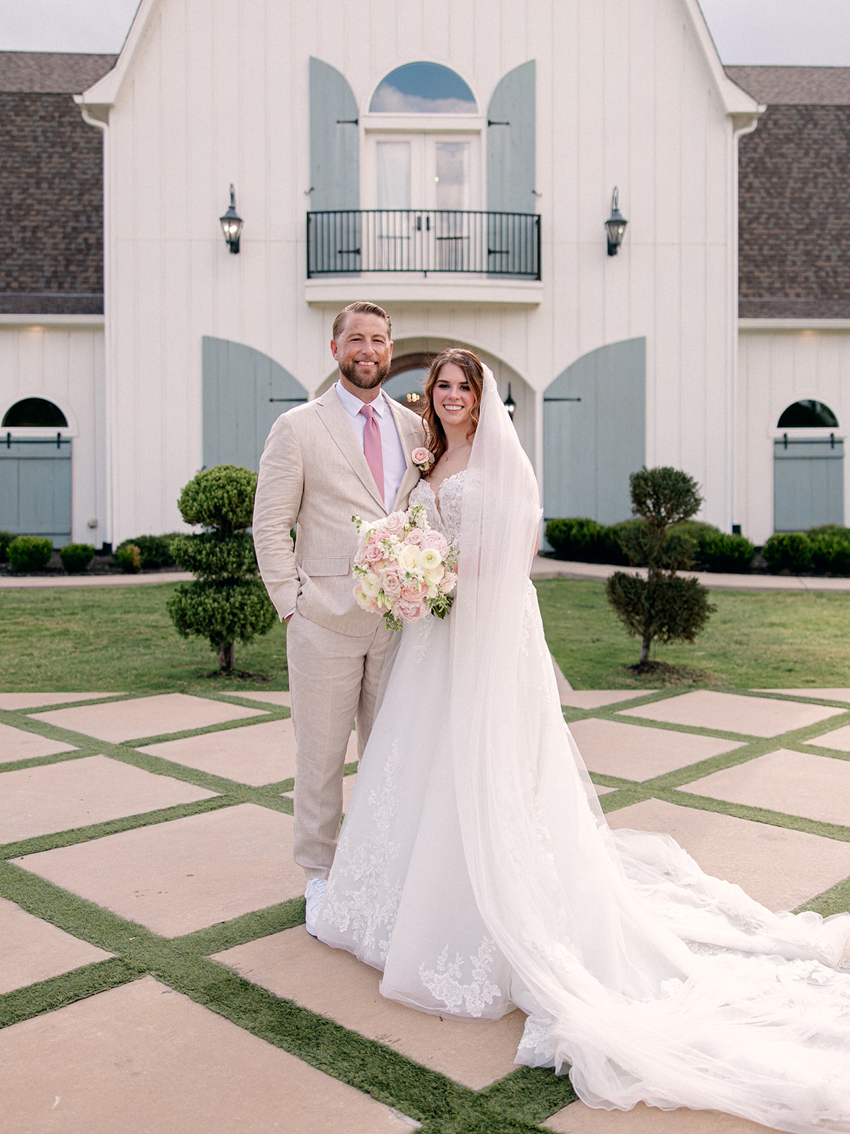 Bride and groom portraits outside The French Farmhouse wedding venue
