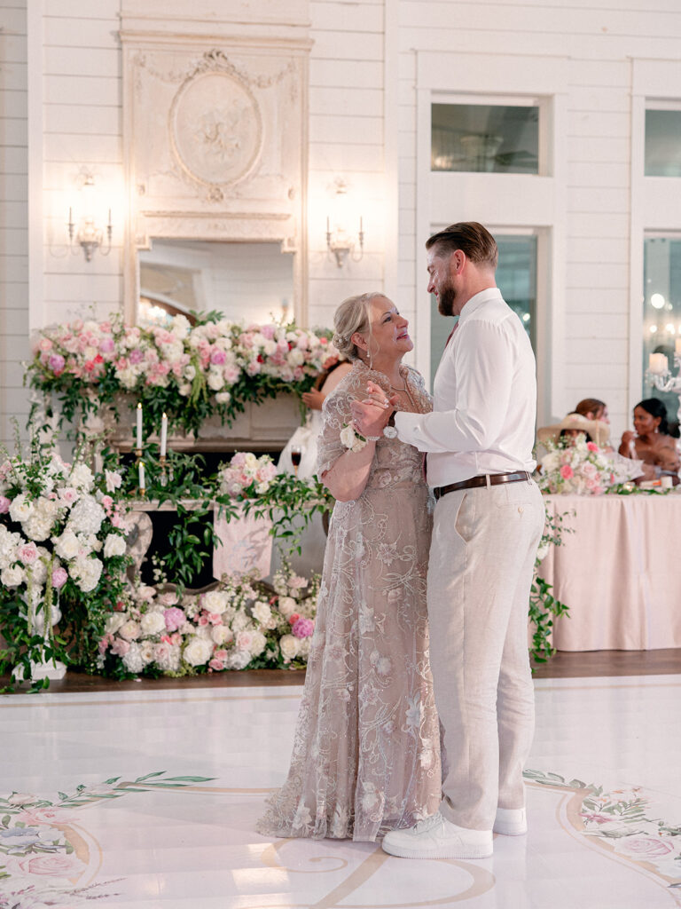 Mother and son dancing together